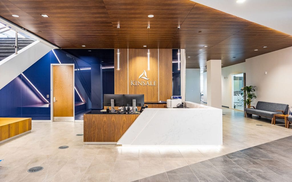 blue backpainted glass by the reception desk at kinsale corporate building in richmond va